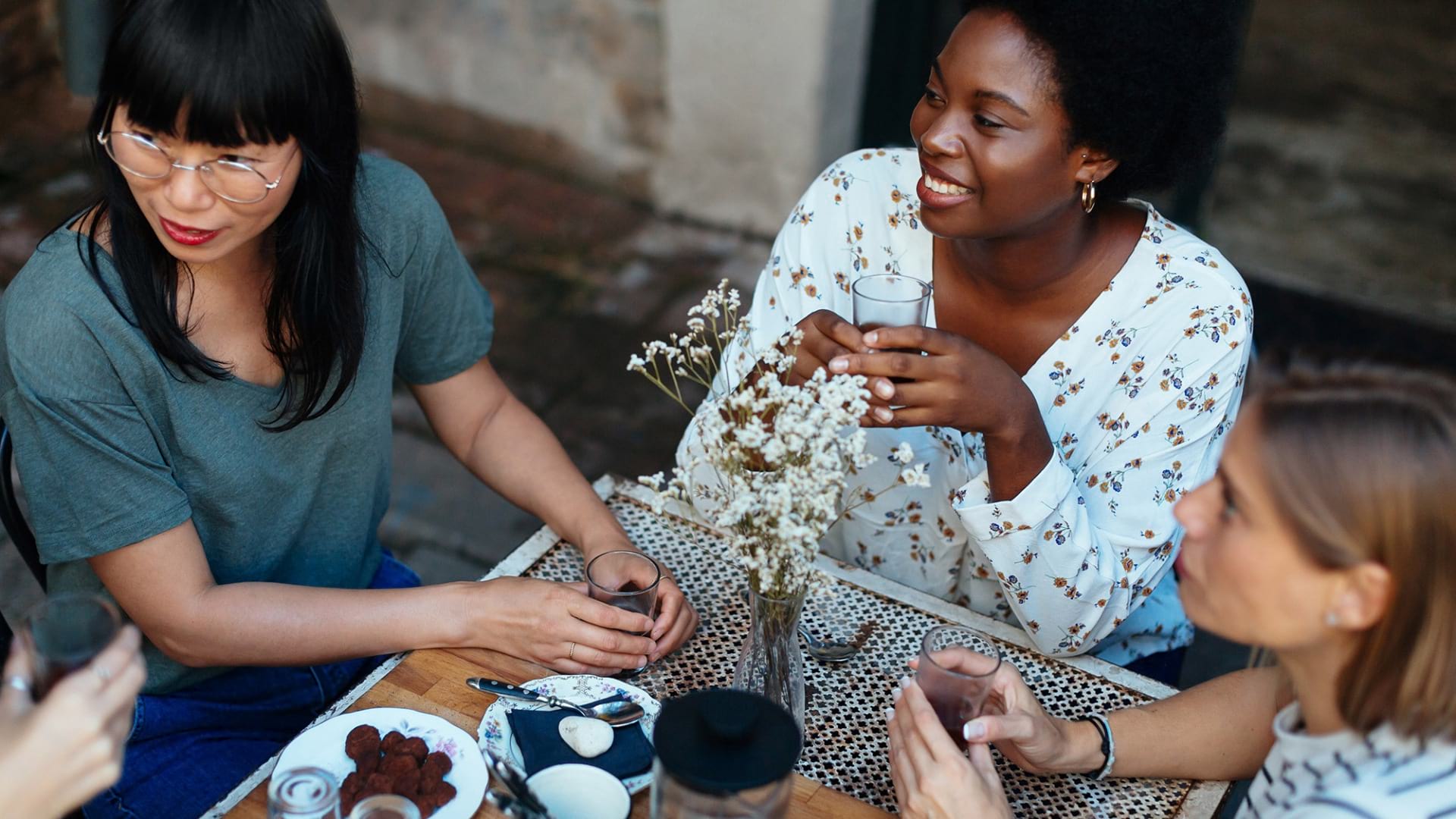 Lifestyle Image Of Friends Dining